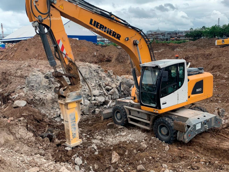 Гидромолот Epiroc (Atlas Copco) MB1200 на колесном экскаваторе