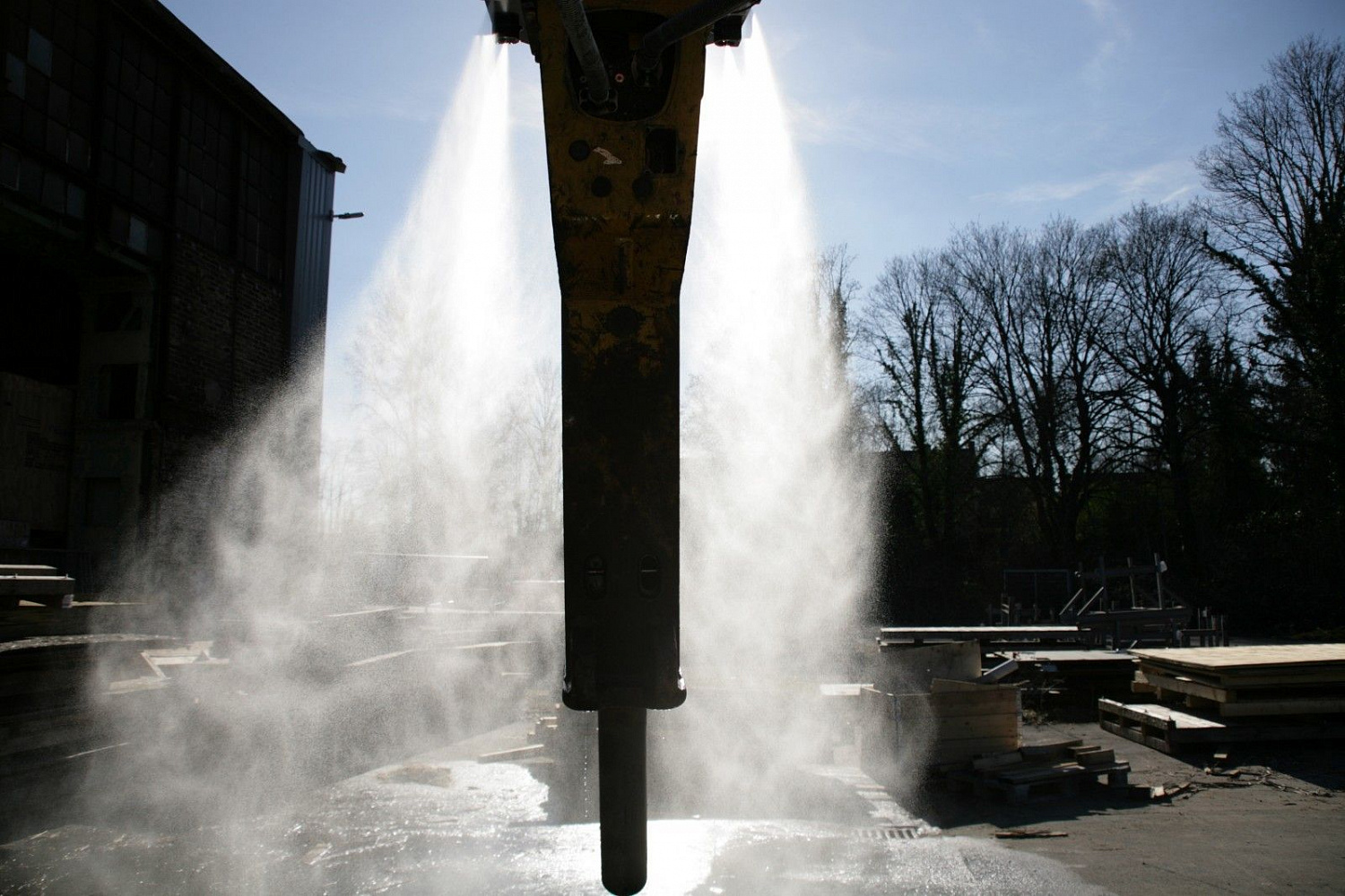 Система распыления воды для гидромолота